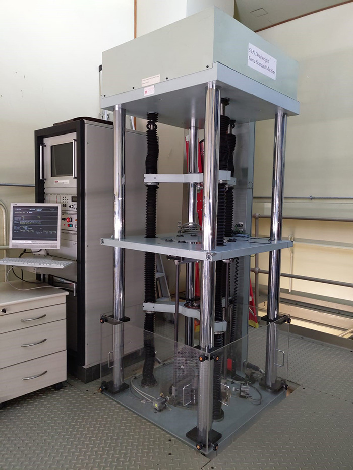 Fig. 1 Deadweight type force machine at the Standards and Calibration Laboratory 1
